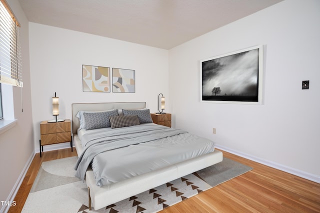 1002 Willow Dr Unit 37, Chapel Hill, NC 27514 - bedroom featuring wood finished floors and baseboards