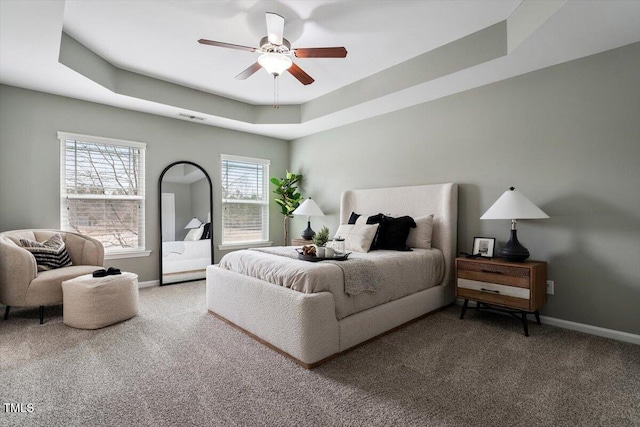 2060 Jersey City Pl, Apex, NC 27523 - bedroom featuring carpet floors, baseboards, and a raised ceiling