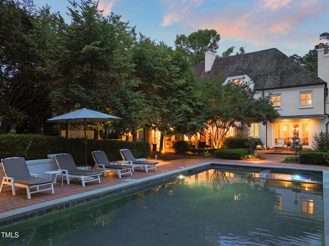 3307 Devon Rd, Durham, NC 27707 - view of swimming pool featuring a patio and a pool with connected hot tub