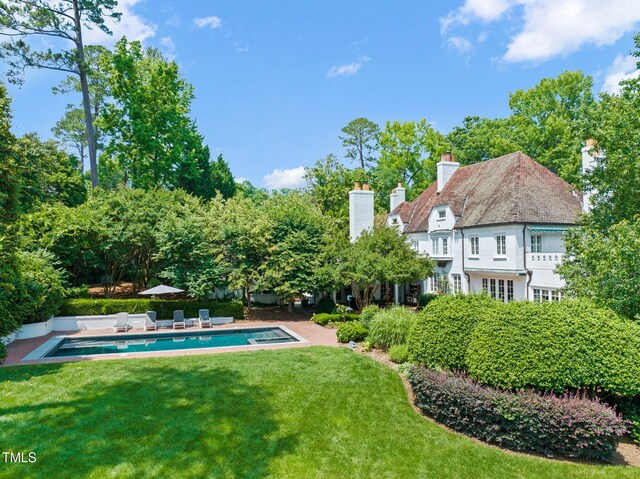 3307 Devon Rd, Durham, NC 27707 - view of green lawn featuring an outdoor pool