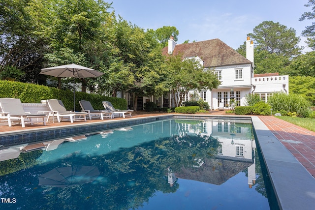 3307 Devon Rd, Durham, NC 27707 - outdoor pool featuring french doors and a patio area