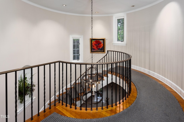 3307 Devon Rd, Durham, NC 27707 - stairs with wood finished floors, crown molding, baseboards, and recessed lighting