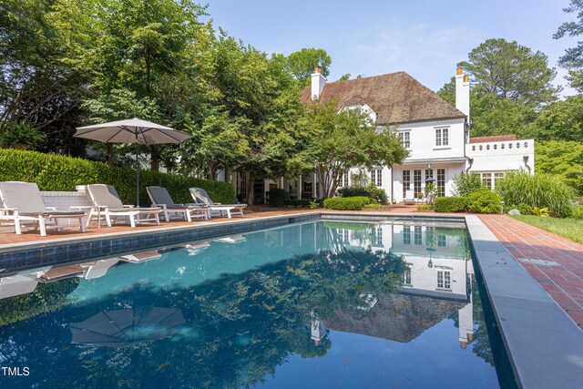 3307 Devon Rd, Durham, NC 27707 - swimming pool featuring french doors and a patio