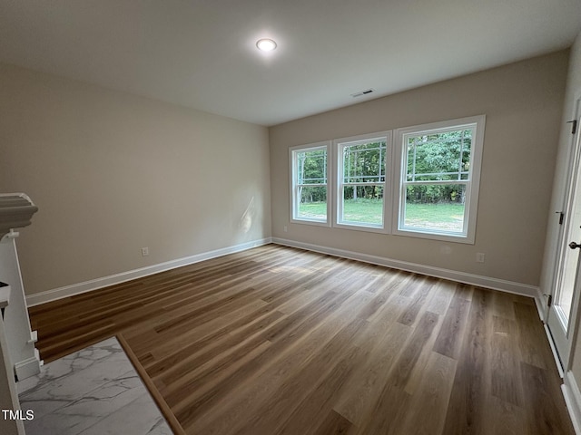 78 Mineral Springs Way, Benson, NC 27504 - unfurnished room with wood finished floors and baseboards