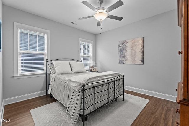 33 Davidson St, Clayton, NC 27527 - bedroom featuring dark wood finished floors, baseboards, and a ceiling fan
