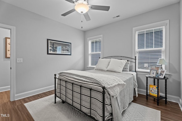 33 Davidson St, Clayton, NC 27527 - bedroom featuring baseboards, wood finished floors, and a ceiling fan