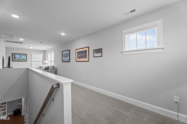 33 Davidson St, Clayton, NC 27527 - hall featuring an upstairs landing, baseboards, recessed lighting, healthy amount of natural light, and carpet