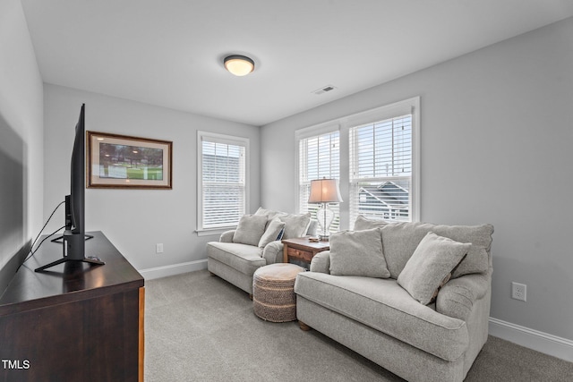 33 Davidson St, Clayton, NC 27527 - living area with light colored carpet and baseboards