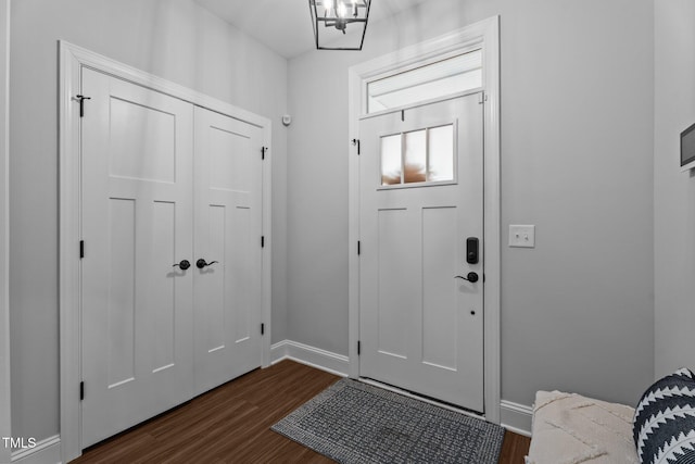 33 Davidson St, Clayton, NC 27527 - entryway featuring dark wood finished floors and baseboards