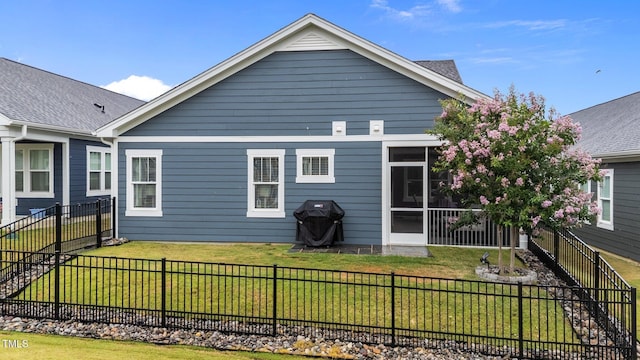 33 Davidson St, Clayton, NC 27527 - rear view of house with a sunroom