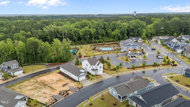 33 Davidson St, Clayton, NC 27527 - aerial view of residential area featuring a heavily wooded area