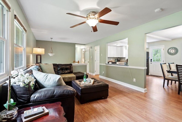 1109 Buckingham Rd, Garner, NC 27529 - living room featuring wood finished floors and ceiling fan