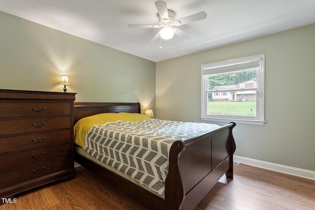 1109 Buckingham Rd, Garner, NC 27529 - bedroom featuring wood finished floors, baseboards, and ceiling fan