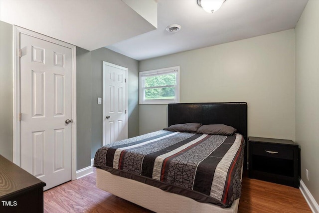 1109 Buckingham Rd, Garner, NC 27529 - bedroom featuring wood finished floors and baseboards