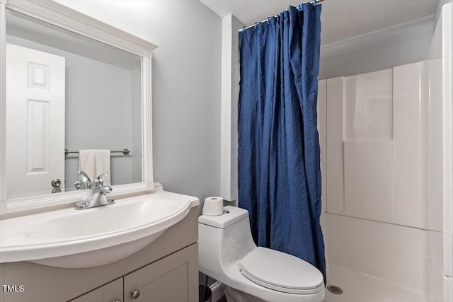 1109 Buckingham Rd, Garner, NC 27529 - full bathroom featuring vanity, a shower with shower curtain, and toilet