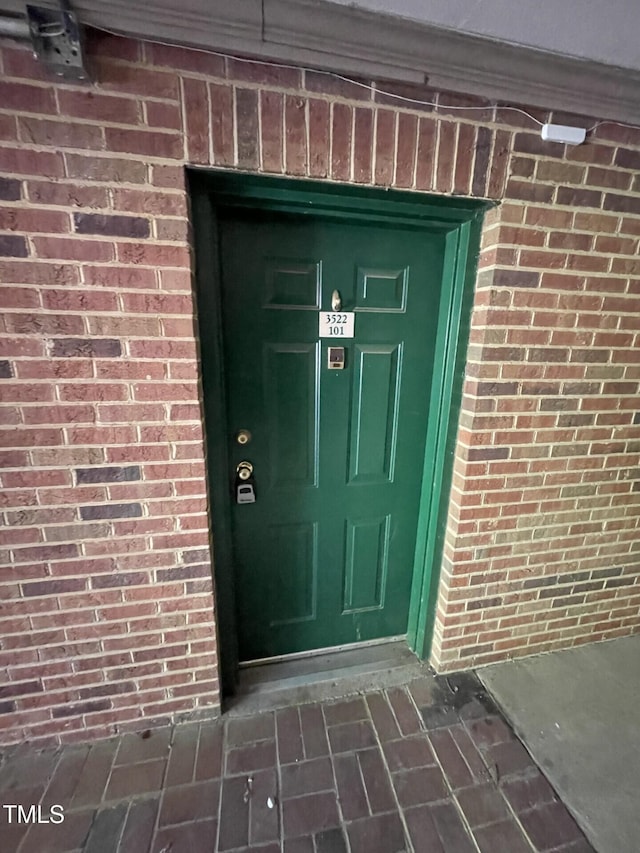 3522 Ivy Commons Dr Unit 101, Raleigh, NC 27606 - doorway to property with brick siding