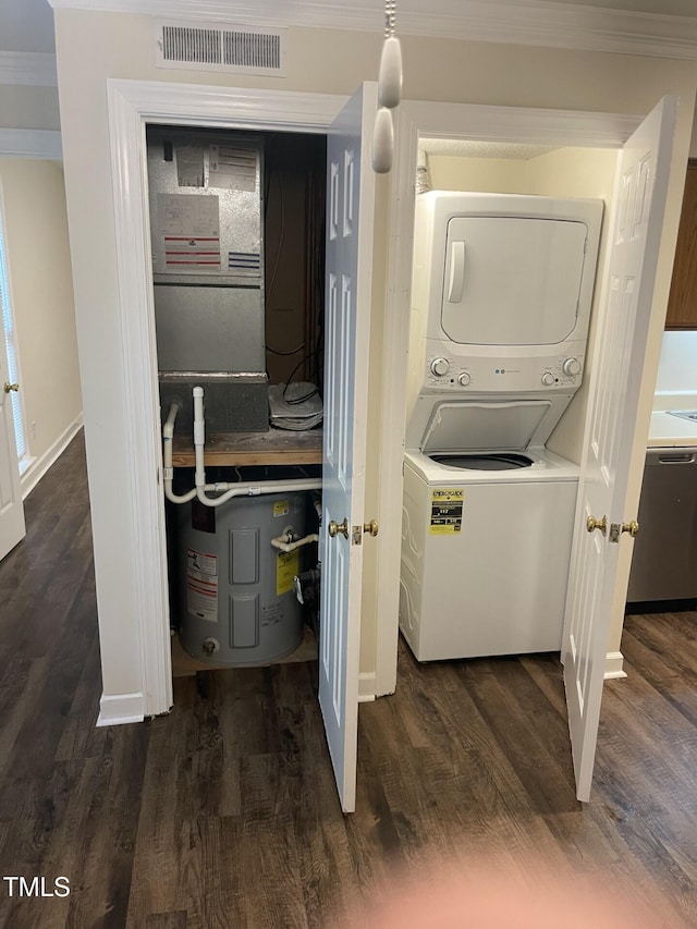 3522 Ivy Commons Dr Unit 101, Raleigh, NC 27606 - laundry room with stacked washing machine and dryer, water heater, wood finished floors, crown molding, and baseboards