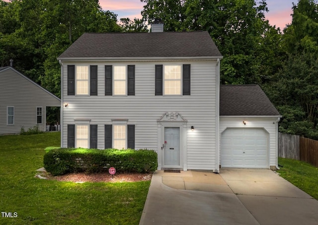 4221 Ivy Hill Rd, Raleigh, NC 27616 - colonial inspired home with driveway, a chimney, an attached garage, and roof with shingles