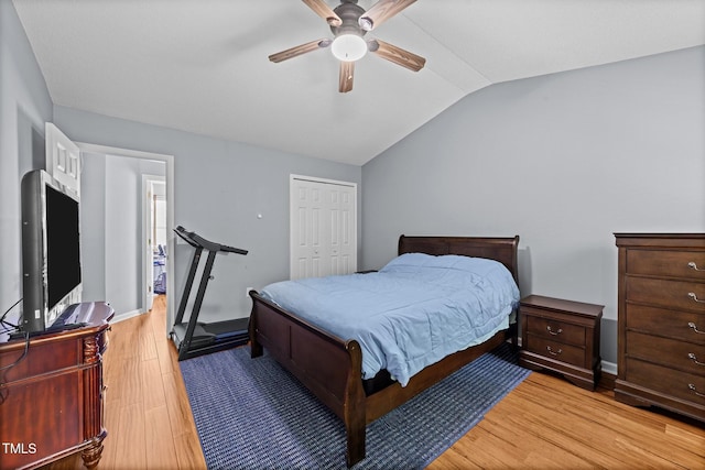 4221 Ivy Hill Rd, Raleigh, NC 27616 - bedroom with lofted ceiling, light wood-type flooring, a closet, baseboards, and ceiling fan