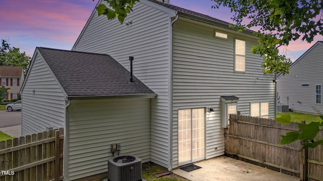 4221 Ivy Hill Rd, Raleigh, NC 27616 - back of house with central air condition unit and a shingled roof