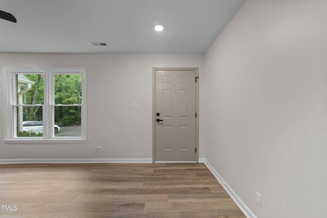 708 Powell Dr Unit B, Raleigh, NC 27606 - foyer featuring light wood-style flooring, baseboards, and recessed lighting