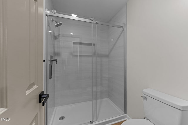 708 Powell Dr Unit B, Raleigh, NC 27606 - bathroom featuring toilet and a shower stall