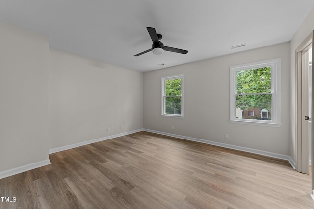 708 Powell Dr Unit B, Raleigh, NC 27606 - spare room with light wood-type flooring, baseboards, and ceiling fan