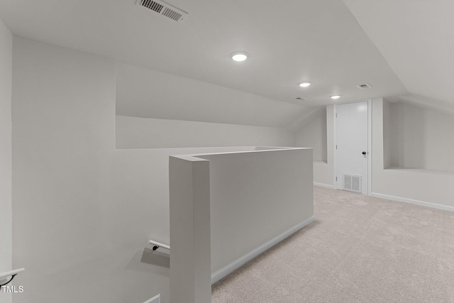 708 Powell Dr Unit B, Raleigh, NC 27606 - bonus room featuring vaulted ceiling, light carpet, recessed lighting, and baseboards