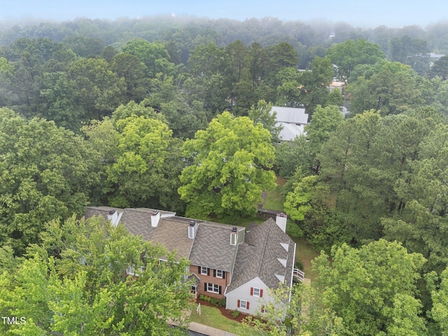 708 Powell Dr Unit B, Raleigh, NC 27606 - aerial view of property and surrounding area with a heavily wooded area