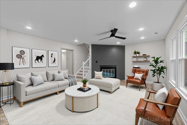 708 Powell Dr Unit B, Raleigh, NC 27606 - living area featuring ceiling fan, recessed lighting, baseboards, a fireplace, and light wood-style flooring