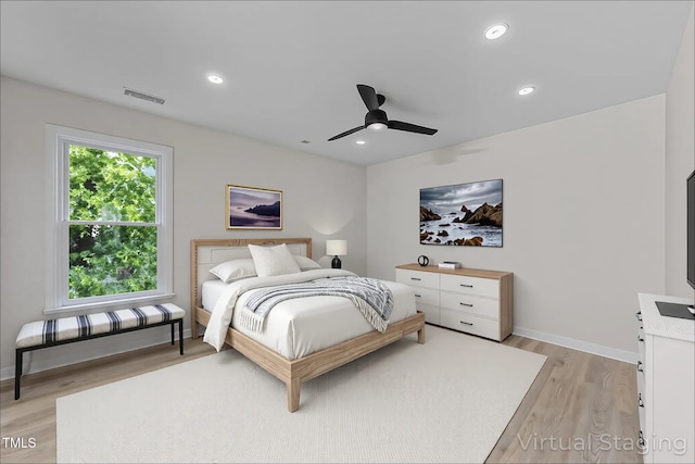 708 Powell Dr Unit B, Raleigh, NC 27606 - bedroom featuring light wood finished floors, baseboards, recessed lighting, and a ceiling fan
