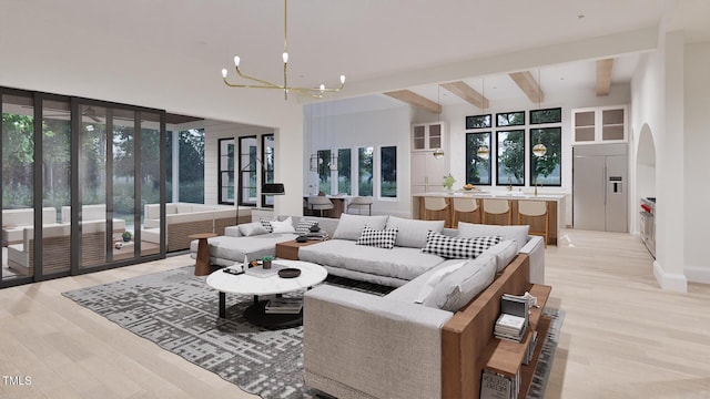 5013 Coronado, Raleigh, NC 27609 - living room with a chandelier, light wood finished floors, arched walkways, beamed ceiling, and baseboards