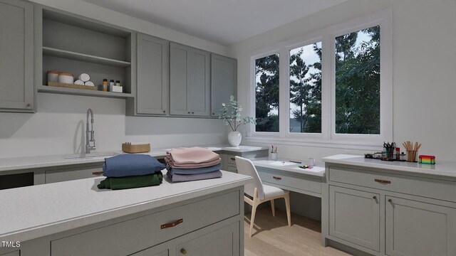 5013 Coronado, Raleigh, NC 27609 - washroom with a sink, light wood finished floors, and an office area