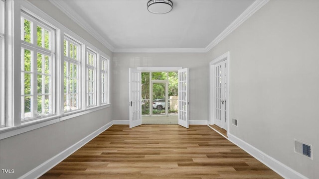 830 S Chestnut St, Henderson, NC 27536 - unfurnished sunroom with french doors