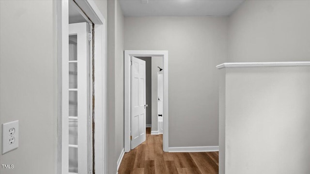 830 S Chestnut St, Henderson, NC 27536 - corridor featuring wood finished floors and baseboards