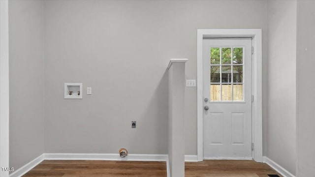 830 S Chestnut St, Henderson, NC 27536 - washroom featuring electric dryer hookup, washer hookup, baseboards, and wood finished floors