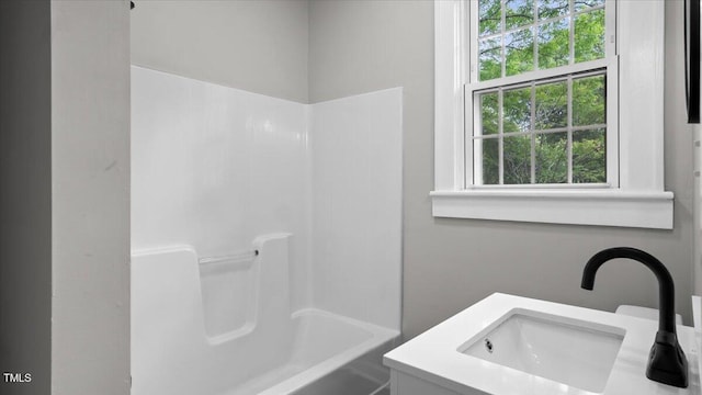 830 S Chestnut St, Henderson, NC 27536 - bathroom with bathtub / shower combination and vanity