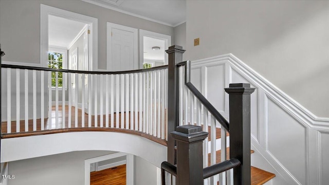 830 S Chestnut St, Henderson, NC 27536 - staircase with crown molding and a decorative wall