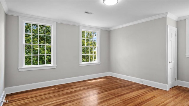 830 S Chestnut St, Henderson, NC 27536 - unfurnished room featuring light wood finished floors, ornamental molding, and baseboards