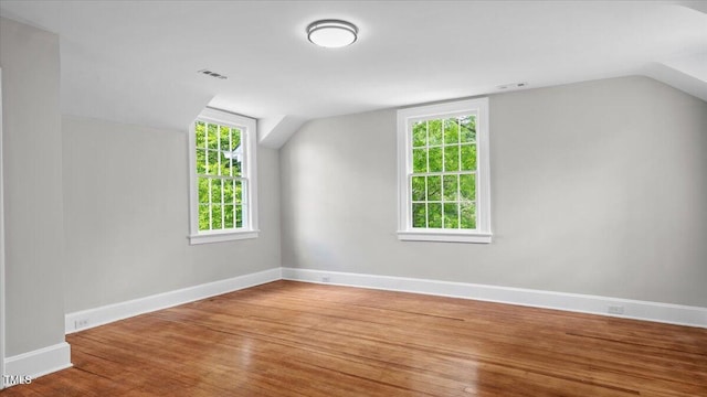 830 S Chestnut St, Henderson, NC 27536 - bonus room featuring wood finished floors, lofted ceiling, and baseboards