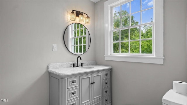 830 S Chestnut St, Henderson, NC 27536 - bathroom featuring vanity and toilet