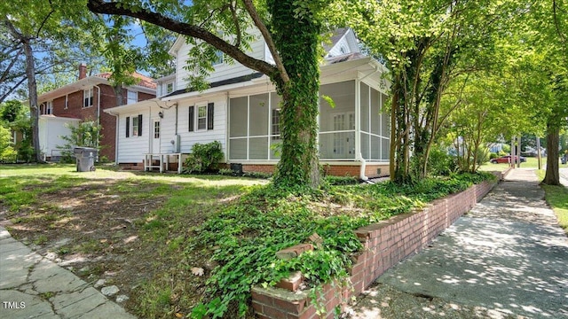 830 S Chestnut St, Henderson, NC 27536 - view of front of house with a sunroom