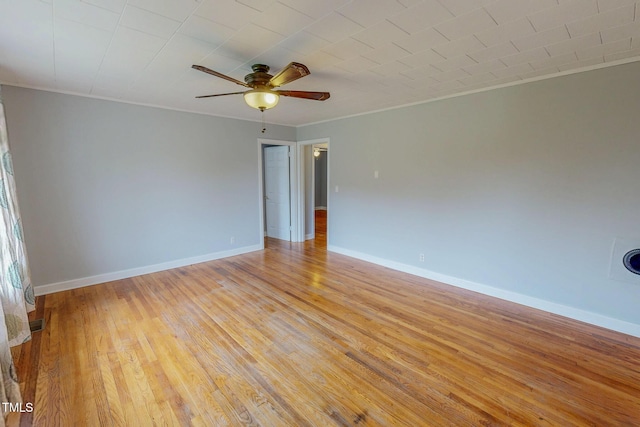 111 Dee Long Rd, Roxboro, NC 27574 - unfurnished room featuring ornamental molding, light wood-style flooring, ceiling fan, and baseboards