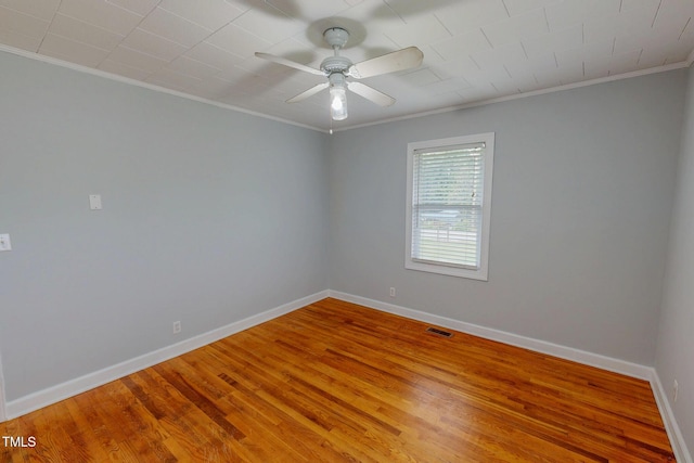 111 Dee Long Rd, Roxboro, NC 27574 - unfurnished room featuring ornamental molding, baseboards, light wood-style flooring, and ceiling fan