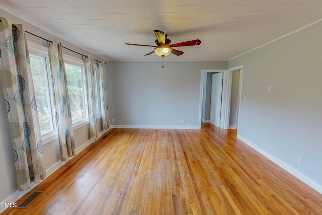 111 Dee Long Rd, Roxboro, NC 27574 - unfurnished room featuring ceiling fan, light wood finished floors, crown molding, and baseboards
