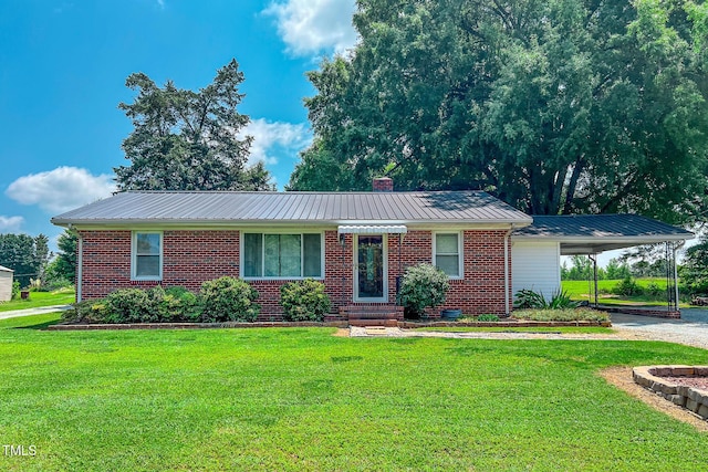 111 Dee Long Rd, Roxboro, NC 27574 - ranch-style house with a front yard, a carport, and brick siding