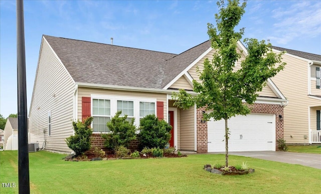 346 E Painted Way, Clayton, NC 27527 - obstructed view of property featuring concrete driveway, brick siding, a front yard, and a shingled roof