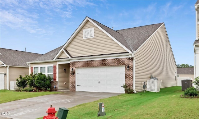 346 E Painted Way, Clayton, NC 27527 - traditional home with brick siding, a garage, driveway, and a front lawn