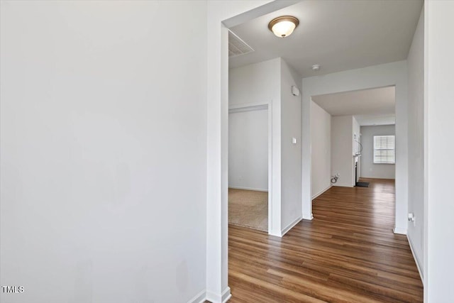 346 E Painted Way, Clayton, NC 27527 - corridor featuring wood finished floors and baseboards