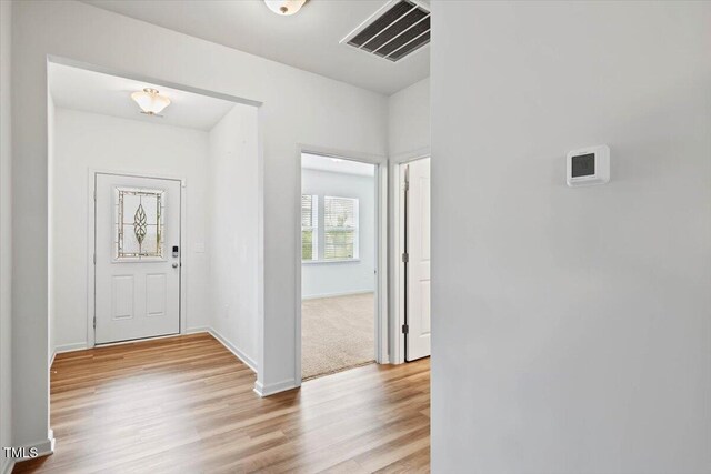 346 E Painted Way, Clayton, NC 27527 - entryway featuring light wood-style flooring and baseboards